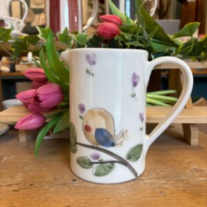 Brocca uccellino "la felicità si costruisce ogni giorno"